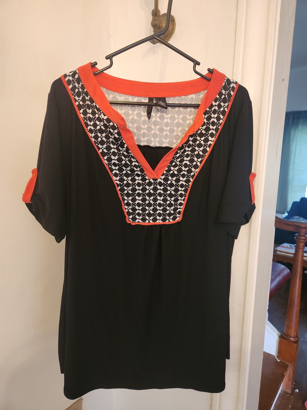 new directions Black Tunic with Coral Trim and Geometric Yoke
